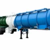Three-axle 22m³ chemical tanker trailer with a green, white and blue tank